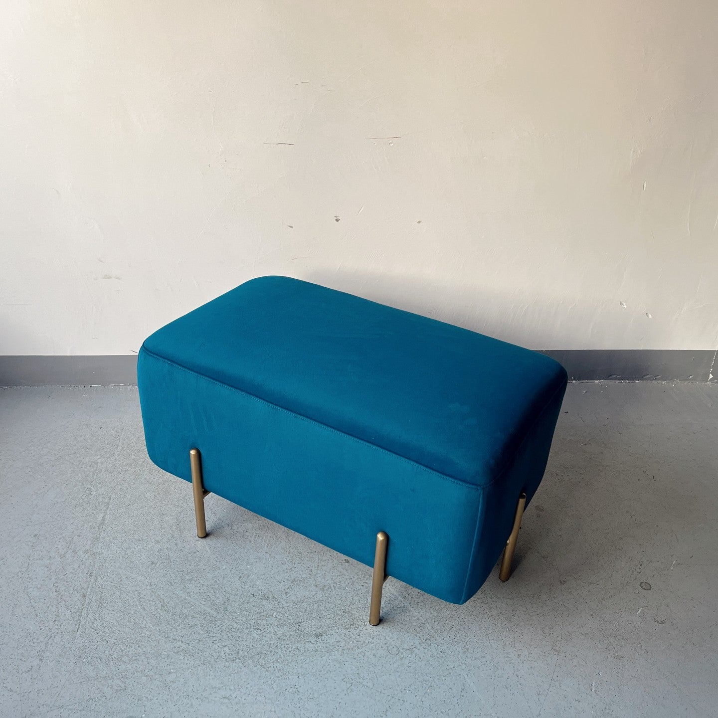 Contemporary Ottoman – Plush Blue Upholstery + Slim Gold Tapered Legs – Versatile Coffee Table Stool