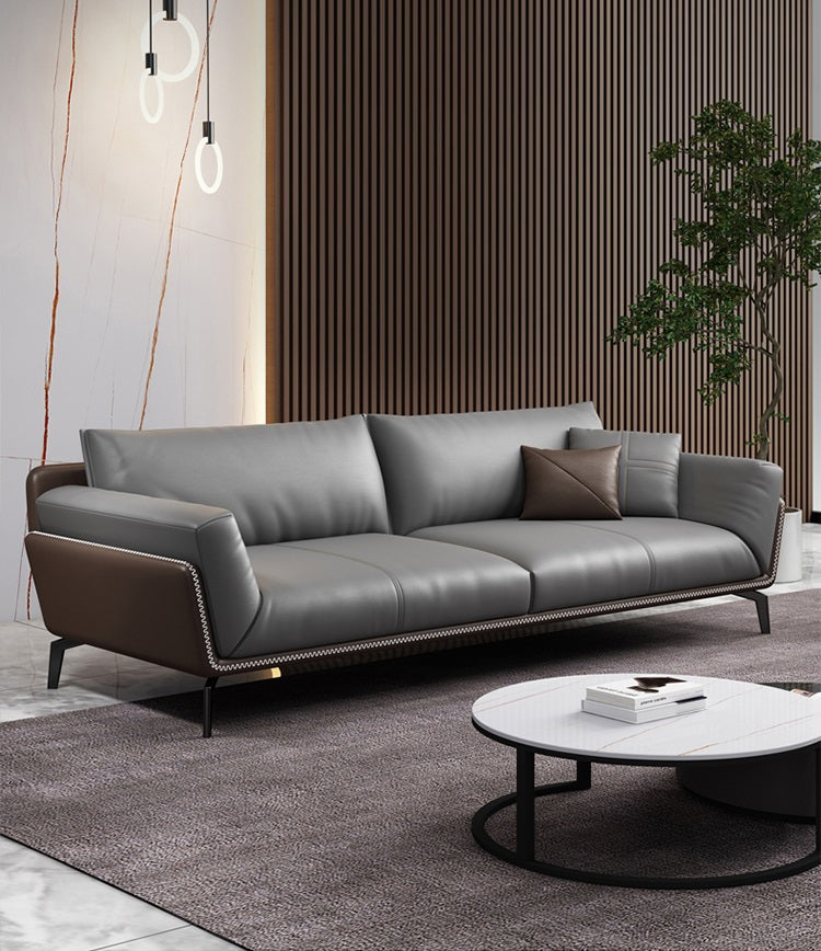 Modern Grey Leather Sofa with Honey Brown Trim - 3-Seater Contrast Stitching & Slim Black Metal Legs | Luxury Living Room Set with Brown/Grey Pillows