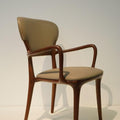 Eternity Curve Contemporary Chair: Minimalist Mastery in Leather & Hardwood